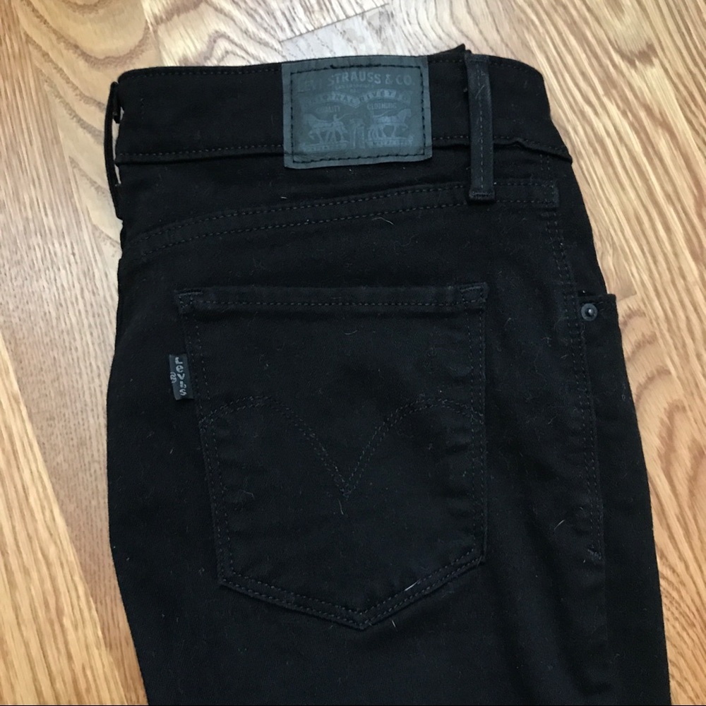 Levi black skinny jeans